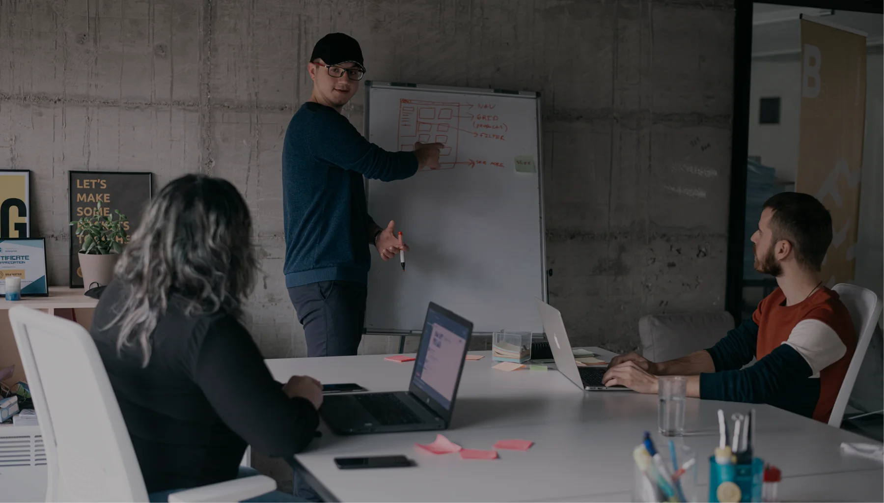 Martin Tenovski leading a design session at a whiteboard